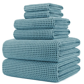 POLYTE waffle bath towel 30x60 inches, plush and quick-dry for spa-like drying after shower.