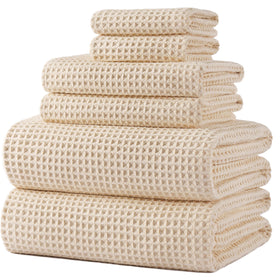 POLYTE waffle-weave bath towel close-up shows quick-drying luxury softness.