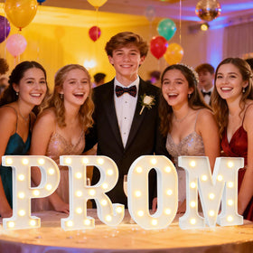 Pooqla PROM warm white table letters illuminate the graduation party decor