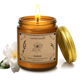 POOTES Gardenia candle in amber jar creates a warm, inviting ambiance for any room.