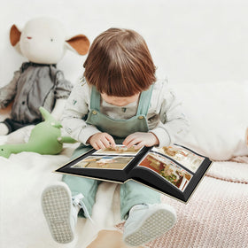 Inside spread showing two 4x6 photos per page for organized keepsakes.