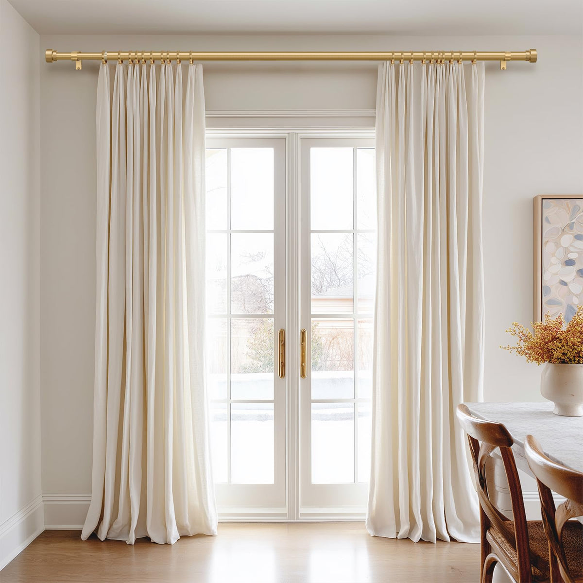 PORTRES Gold end cap finials add a modern decorative touch