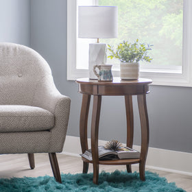 Powell Hazelnut round shelf table side view with elegant cabriole legs