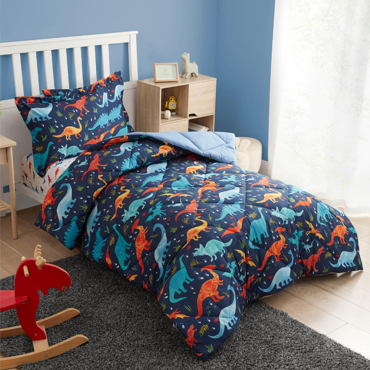 PPOLCA dinosaur pillowcase completes the set with soft, breathable fabric.