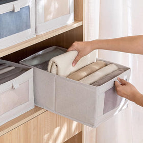 Multi-functional closet organizer bin ideal for clothes, towels, and blankets