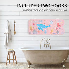 PRATIQUE anti-slip texture on ocean themed bath mat supports stability