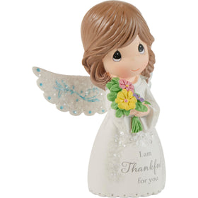 Precious Moments angel display on shelf or mantel, compact and stylish.