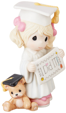 Precious Moments graduation teddy bear figurine shown as a proud student, a heartfelt milestone keepsake
