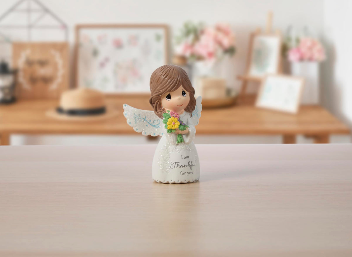 Precious Moments hand-painted resin figure, durable keepsake for gratitude gifts.