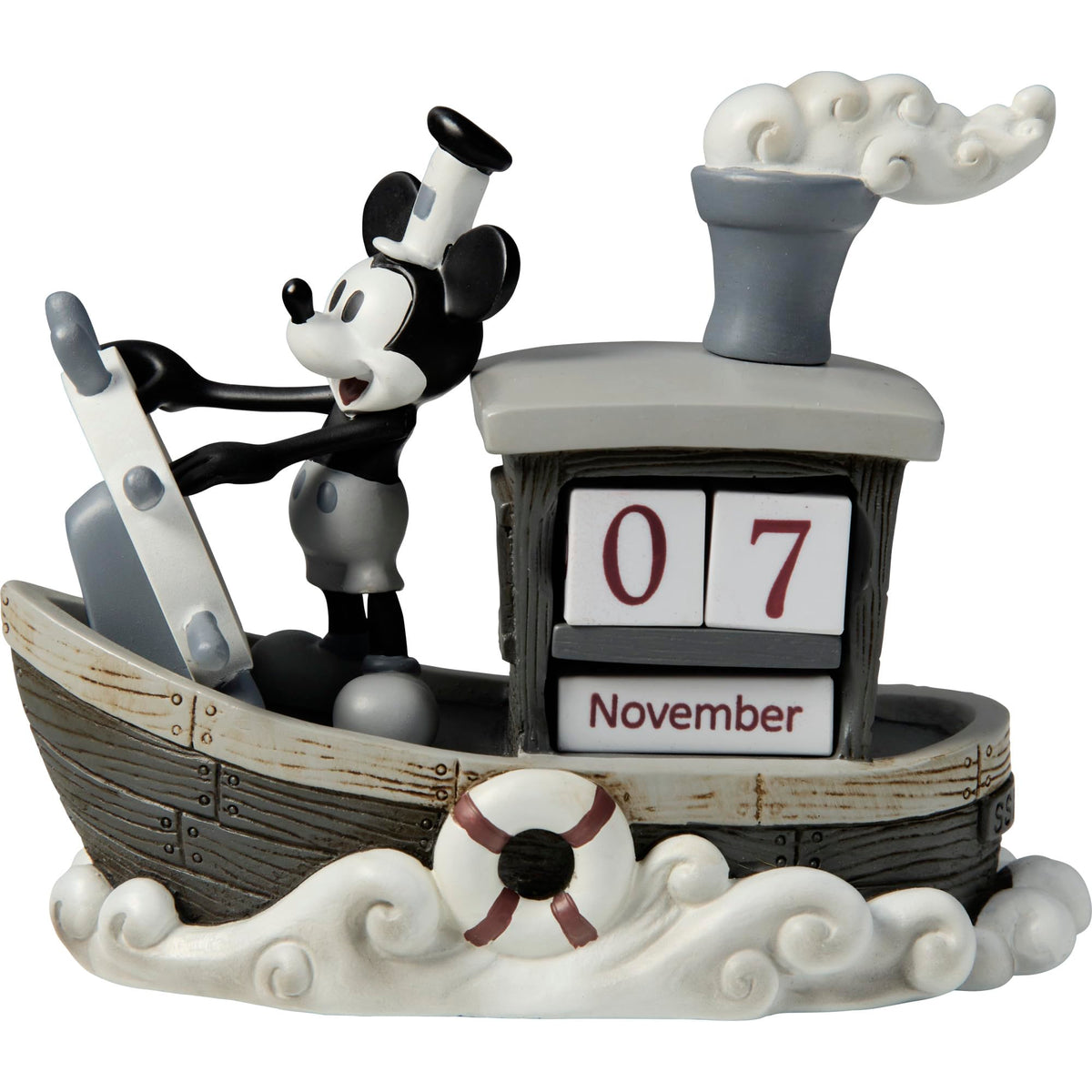 Precious Moments Mickey Endless Calendar Steamboat Willie figurine in nostalgic black-and-white display.