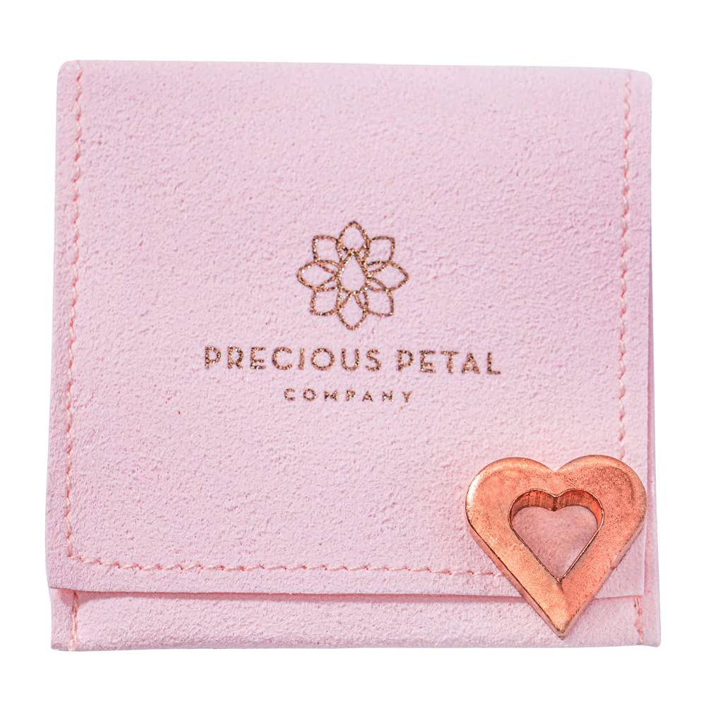 Copper charm stored in micro suede bag keeps things tidy