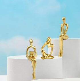 Prettidecor gold thinker pose past inspires focus