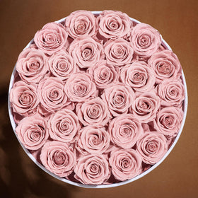 Prifroti white roses convey pure, refined gifting for Mom.
