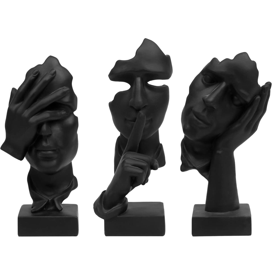 Prosfalt thinker statue trio on desk enhances workspace ambiance.