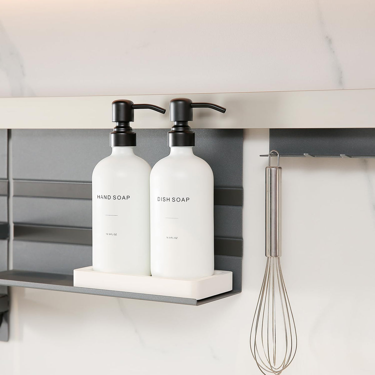 Prus Waso glass body dispenser with metal pump for rust-free reliability.
