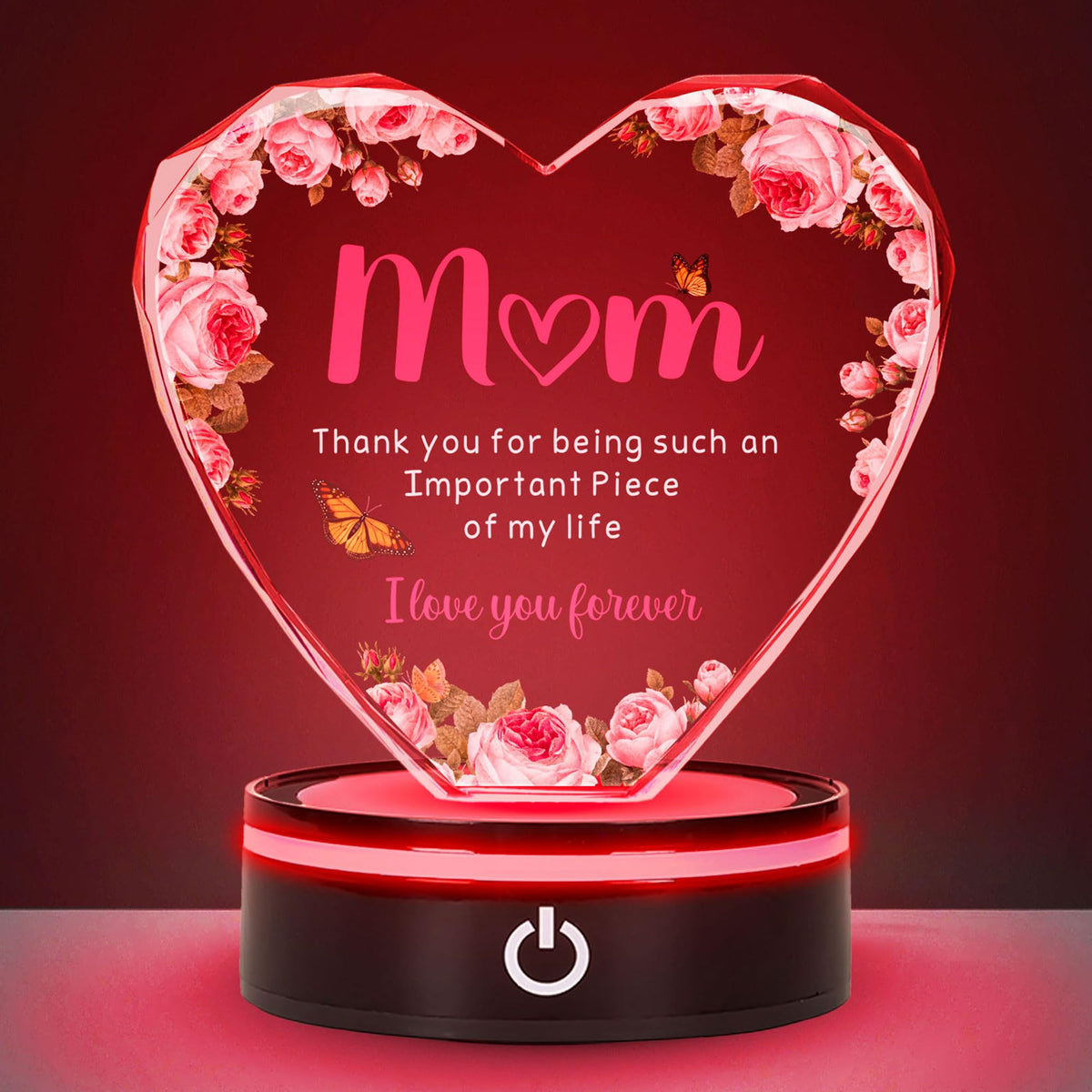 PSPCBS crystal heart keepsake with LED base glows softly on a nightstand