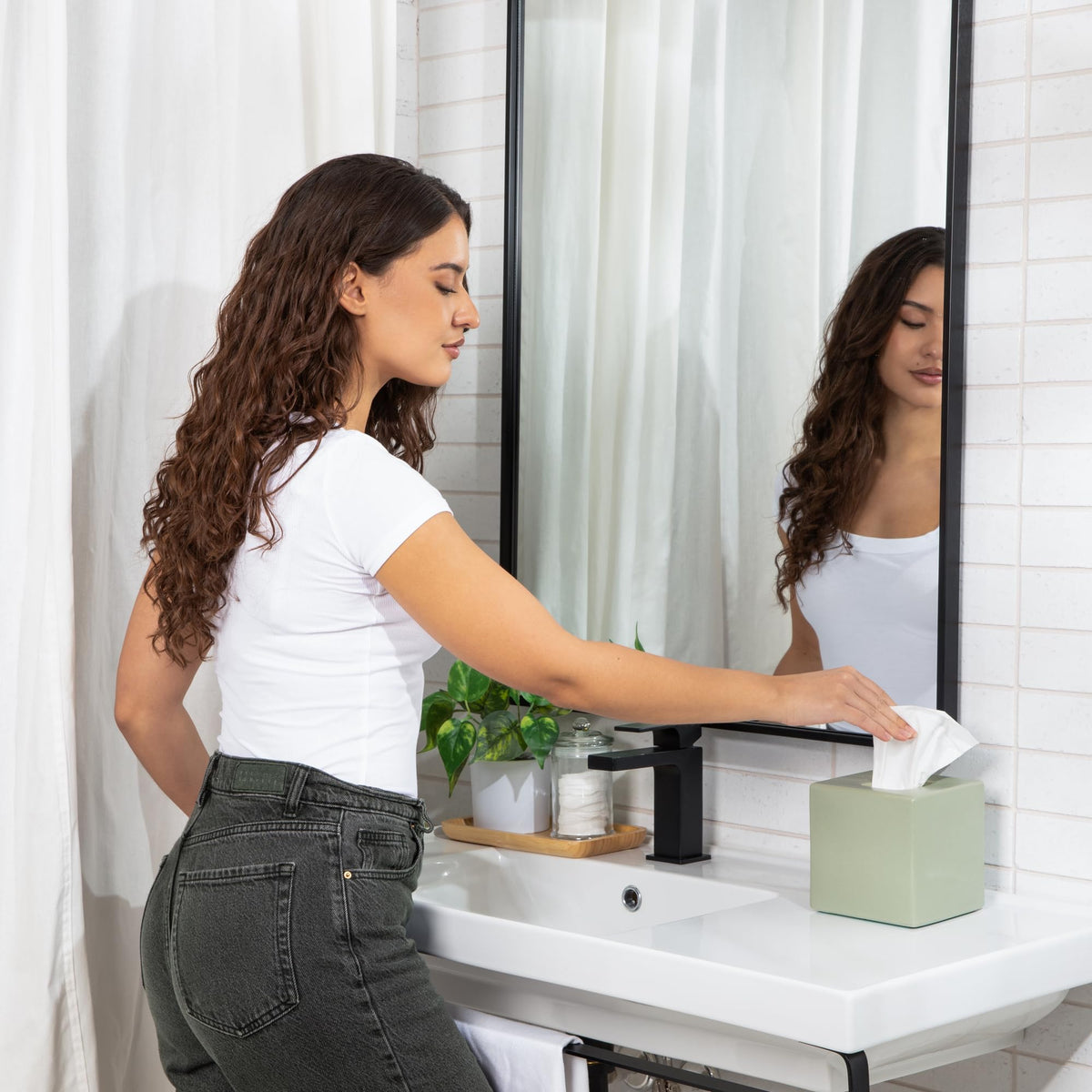 PTB vanity arrangement features white ceramic cover elevating display