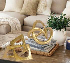 PUHOZN gold geometric round sculpture with detailed texture