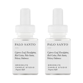 Pura Brooklyn Palo Santo refill bottle delivers long-lasting woody fragrance for shared spaces.