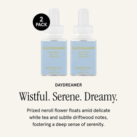 Pura Moodcast Daydreamer refill bottle highlights serenity and white tea with neroli notes.