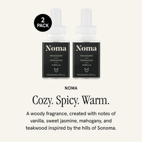Pura and Guy Fox Noma refill with mahogany teakwood for warm ambiance