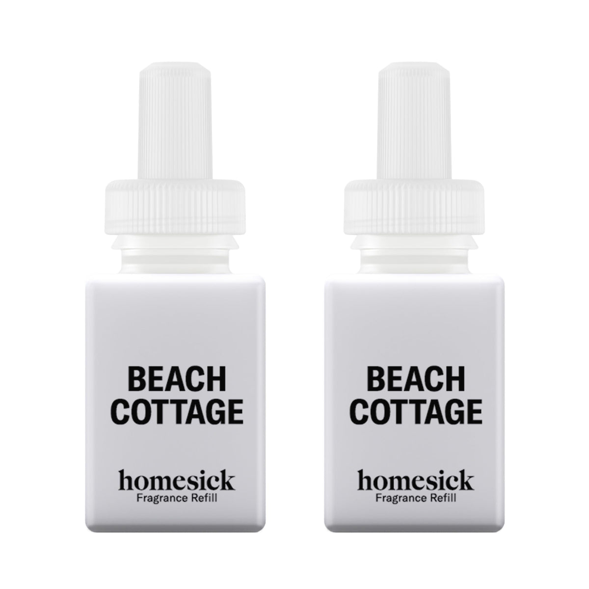 Pura Homesick Beach Cottage refill bottle highlights citrus notes for a bright room.