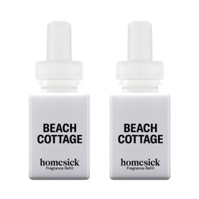 Pura Homesick Beach Cottage refill bottle highlights citrus notes for a bright room.