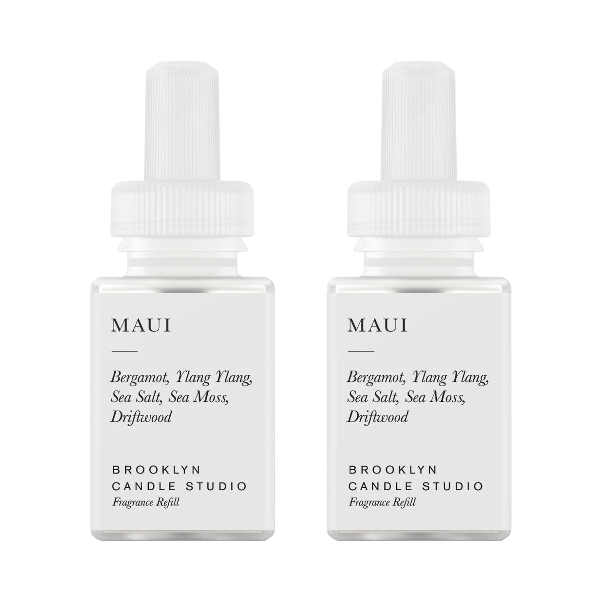 Pura Maui diffuser refill bottle with bergamot and driftwood notes offering long-lasting fragrance