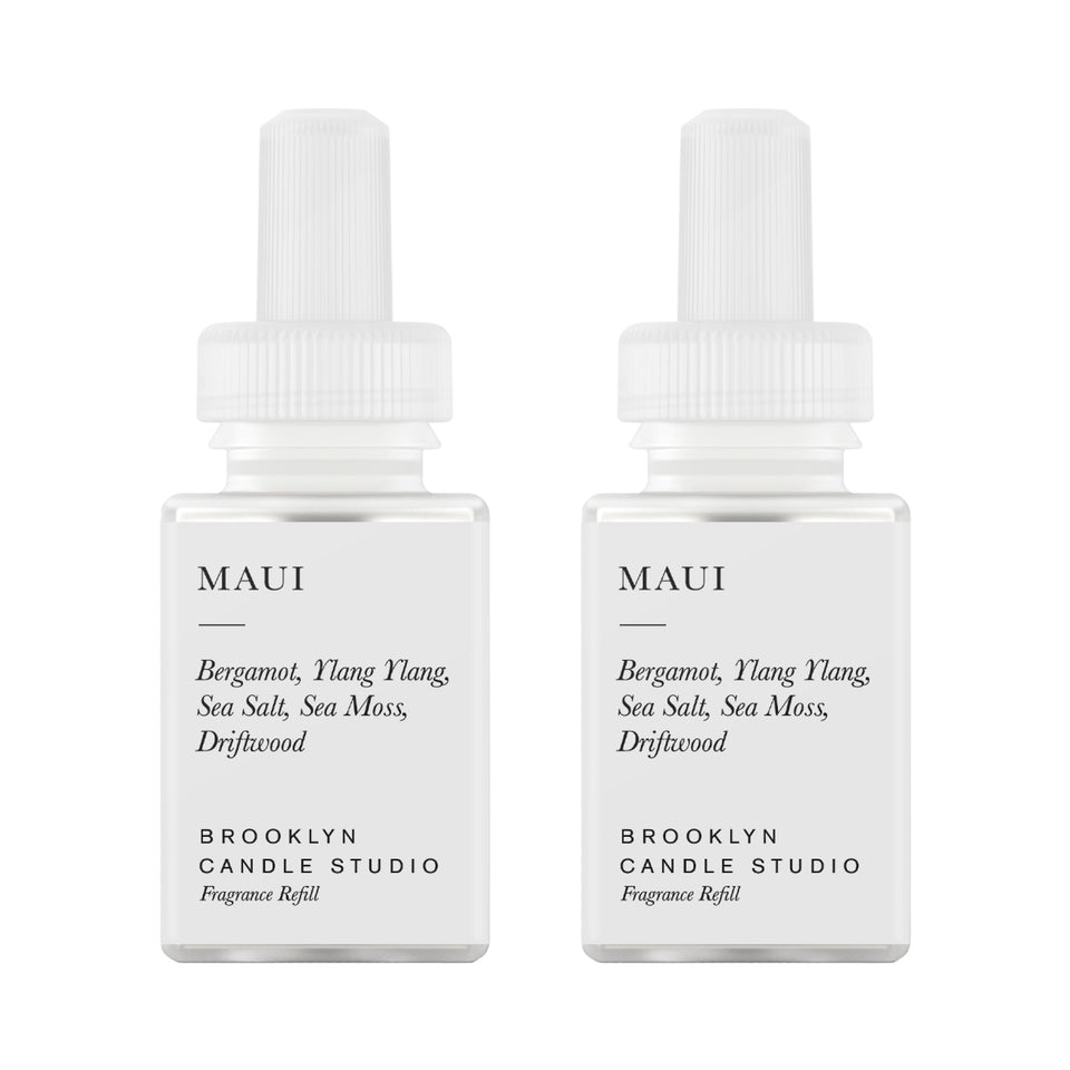 Pura Maui diffuser refill bottle with bergamot and driftwood notes offering long-lasting fragrance