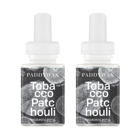 Pura Paddywax refill bottle close-up with tobacco-patchouli aromas.