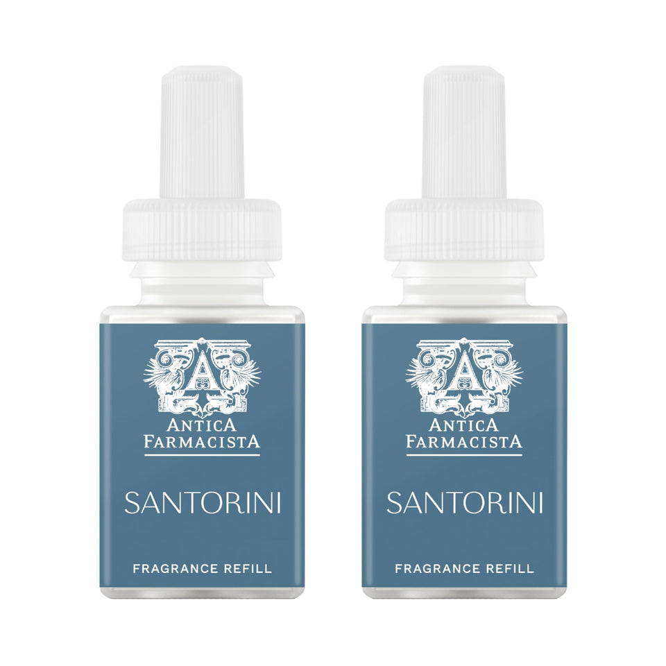 Pura Santorini refill bottle pour with bergamot and saltwater notes for a refreshing space