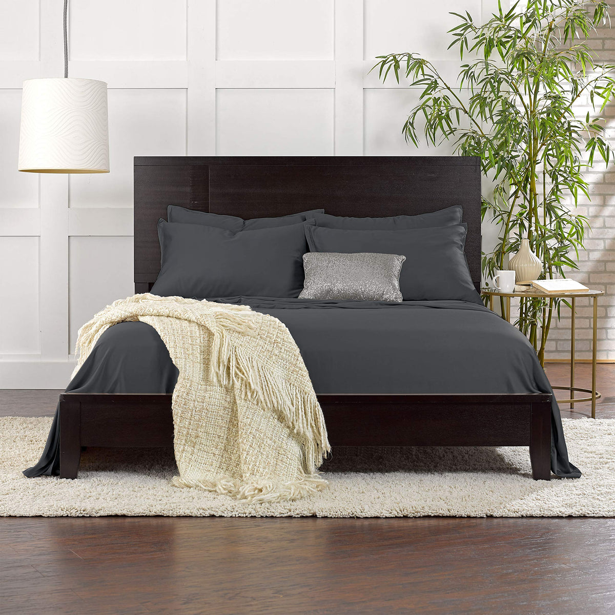 Pure Bamboo charcoal sheets on bed convey cooling comfort and luxury.