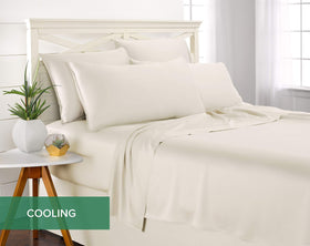 Pure Bamboo king pillowcase Ivory bed-scene conveys luxurious comfort for nightly use.
