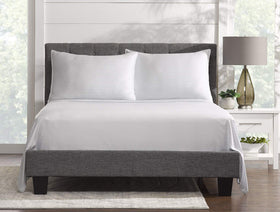 Pure Bamboo King Sheets complete 4-piece king set laid out neatly on bed.