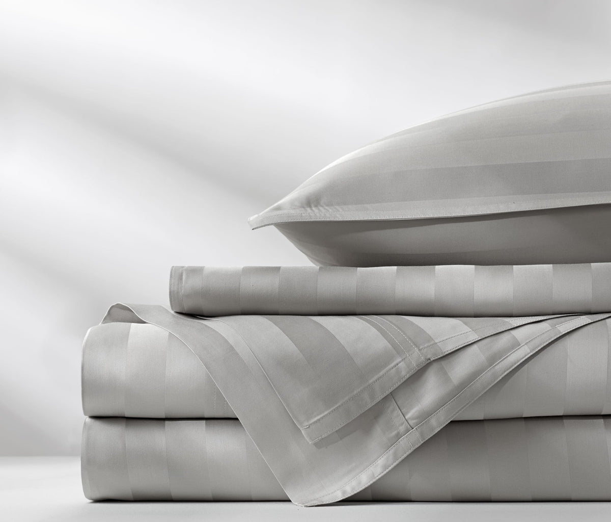 Pure Bamboo Queen Sheets 300-thread-count sateen weave delivers a smooth, durable finish.