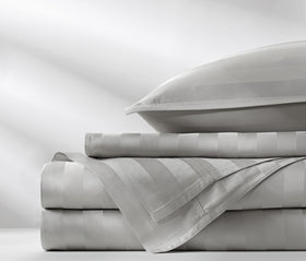 Pure Bamboo Queen Sheets 300-thread-count sateen weave delivers a smooth, durable finish.