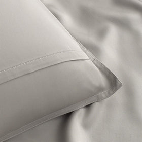 Pure Bamboo Queen Sheets cooling fabric in a bright, airy close-up.