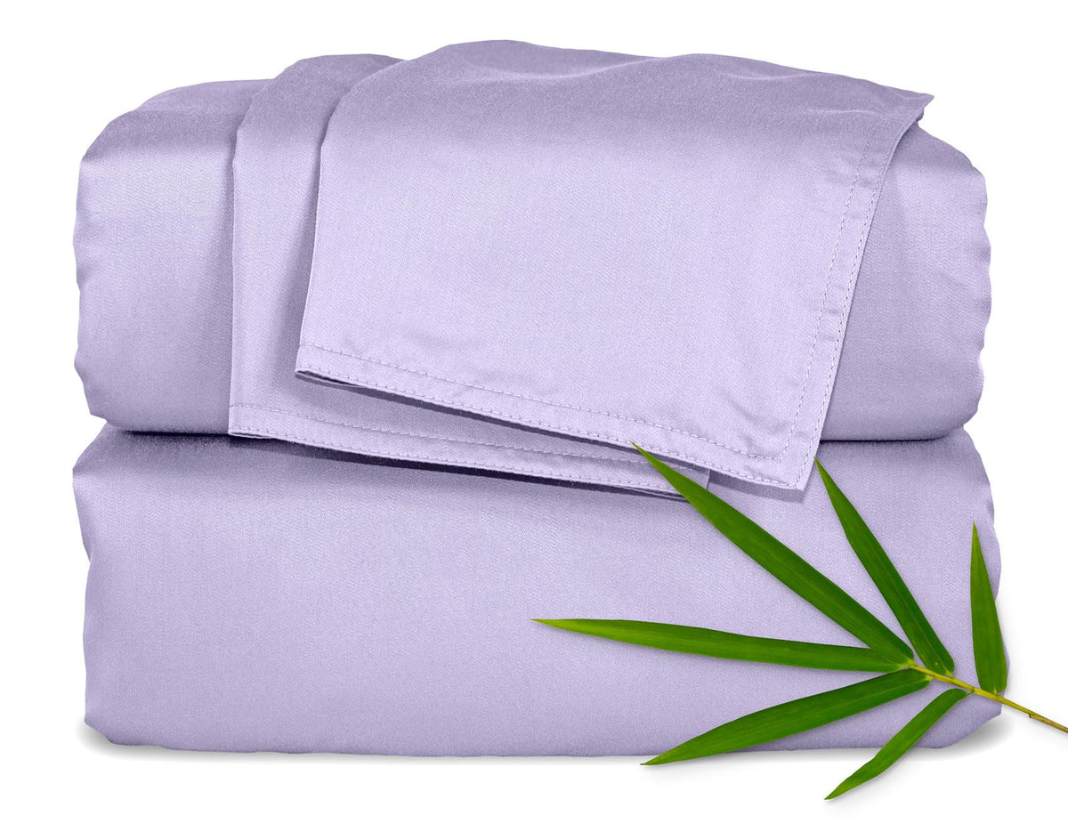 Pure Bamboo queen sheets lavender folded, silky soft feel for luxurious sleep.