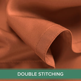 Pure Bamboo terracotta color bedding on bed creates warm, inviting look.