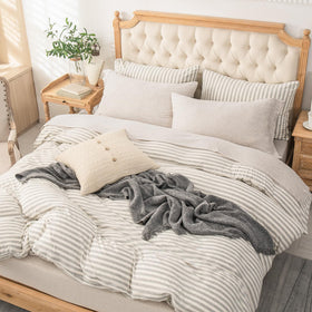 PURE ERA pillowcases in Heather Beige provide smooth, cozy edges for restful sleep.