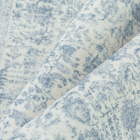 PureCozy blue area rug is kid and pet friendly for busy homes