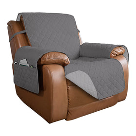 PureFit reversible quilted sofa cover on a gray recliner, guarding against spills.