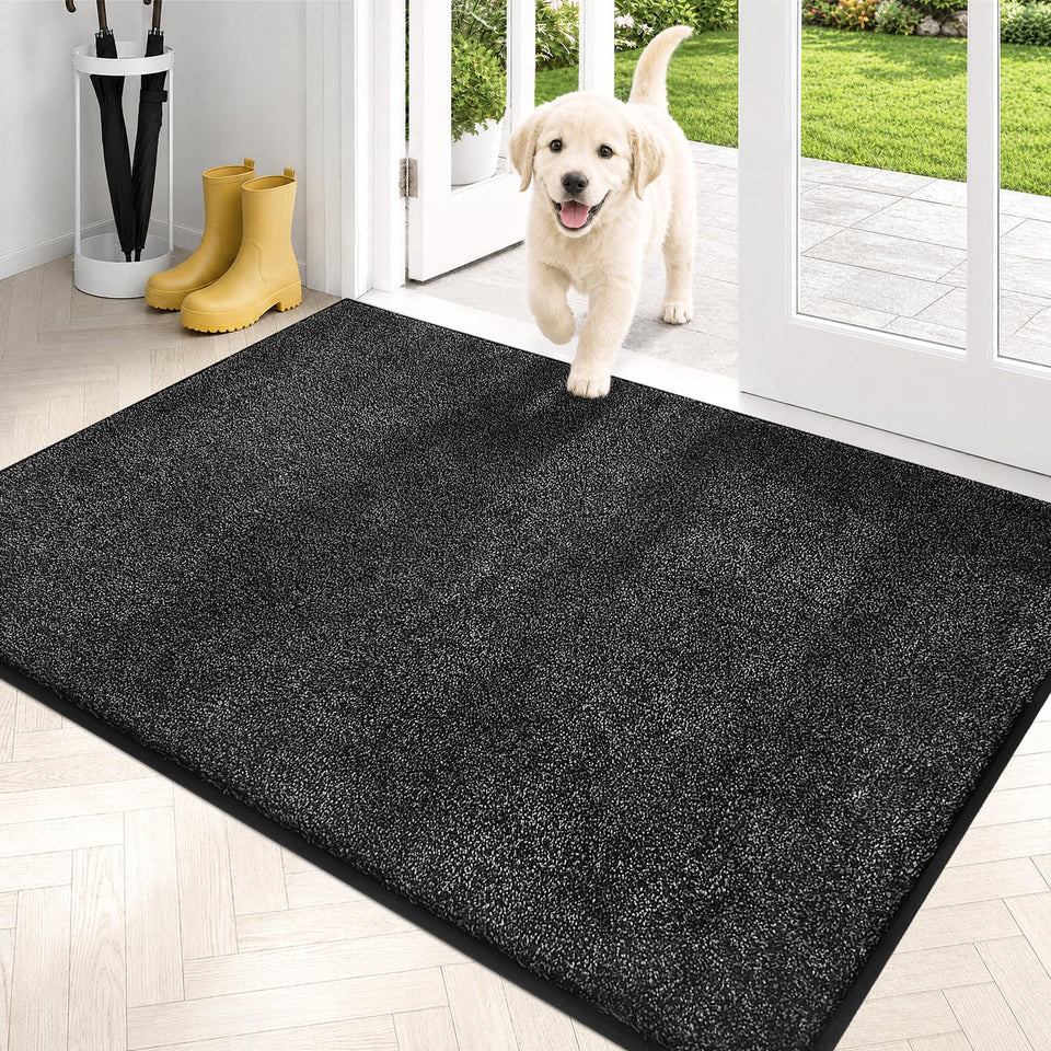 Purrugs dirt-trapping door mat front view captures mud at the doorway