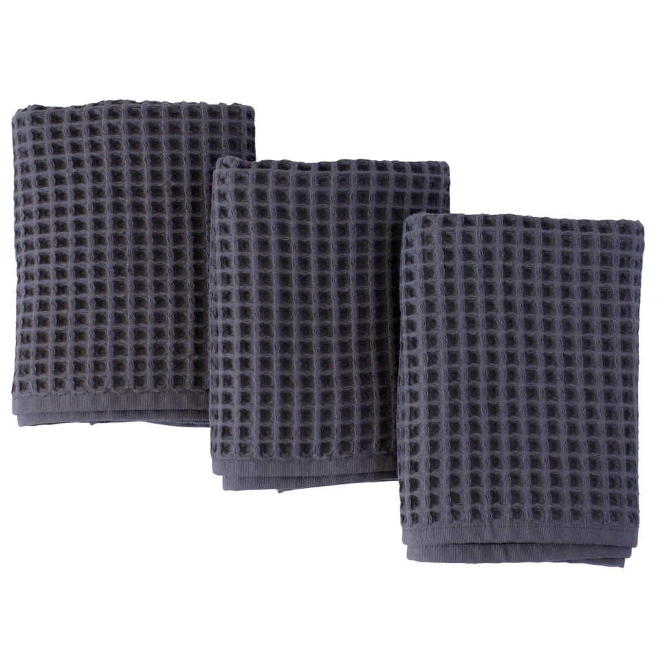 PÜSKÜL natural Turkish cotton waffle towels close-up showing soft texture and quick-dry feel