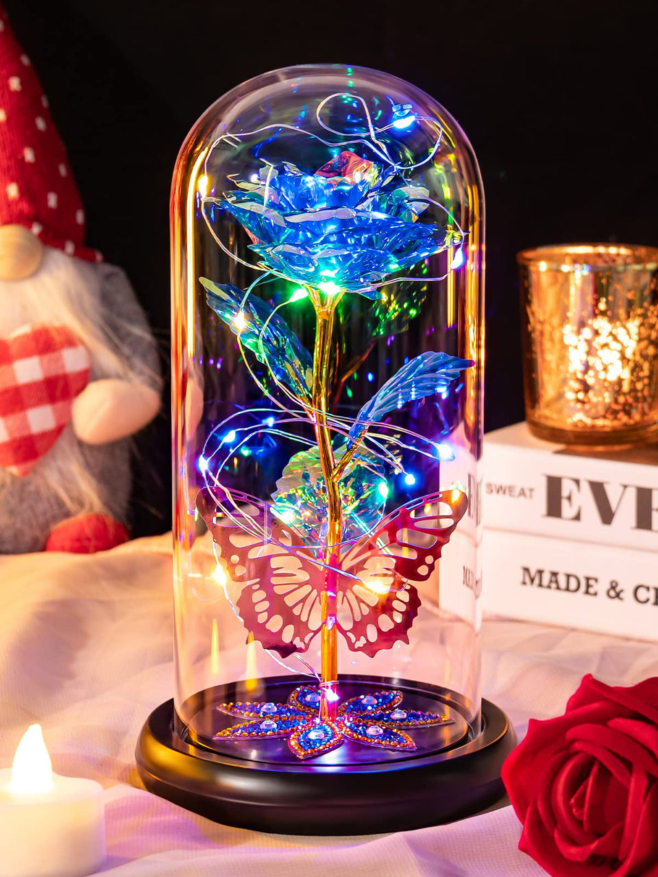 Pusuny galaxy blue rose in a glass dome with soft ambient glow