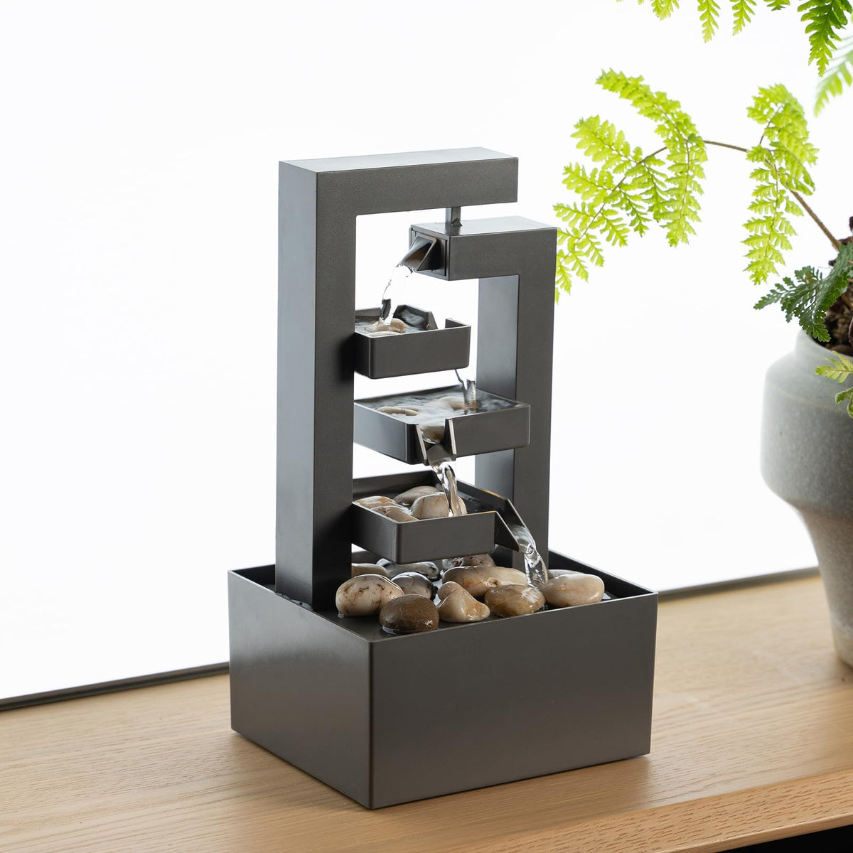 PUULYE desktop waterfall fountain with a 3-tier design creates tranquil ambiance.