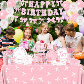 Pymurod pink bow tablecloth protects surfaces and ties the theme.