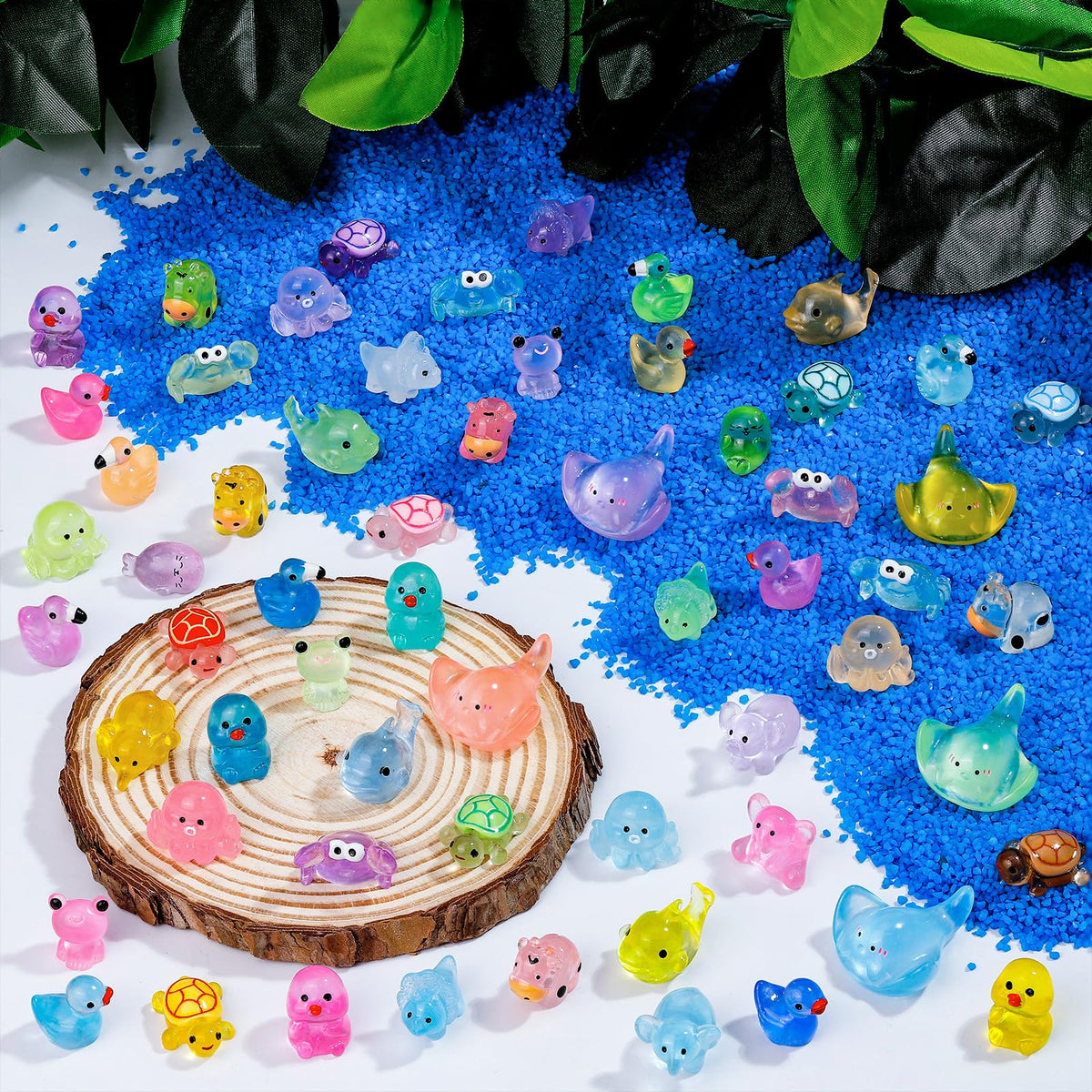 QAUYETM luminous resin elephants glow brightly, ideal as cake toppers or shelf decor