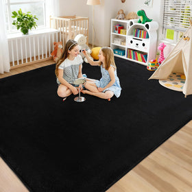 QDUIDU rug with non-slip backing keeps it securely in place on floors.