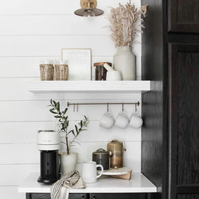 QEEIG three-shelf unit adds depth and organization to a kitchen.